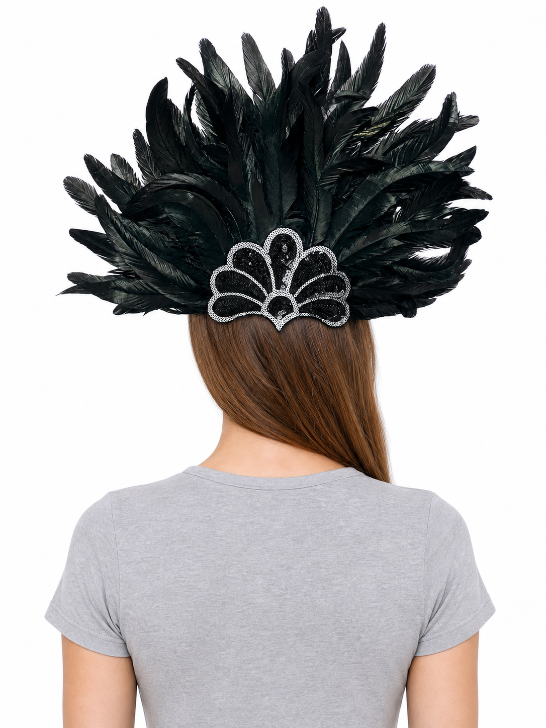 Black feather headpiece shown from the back on a model, with layered plumes extending outward above the hair