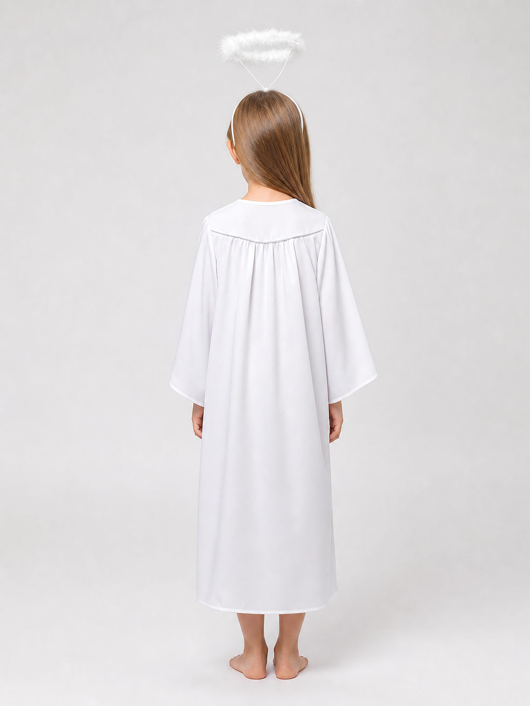 Halo headband with a white angel costume robe, shown from the back on a child model with loose sleeves and gathered fabric