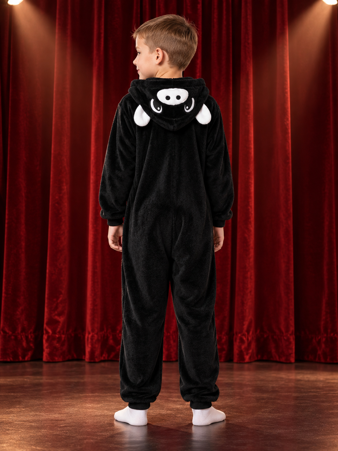 Black and white jumpsuit pajama with skull graphic on the hood