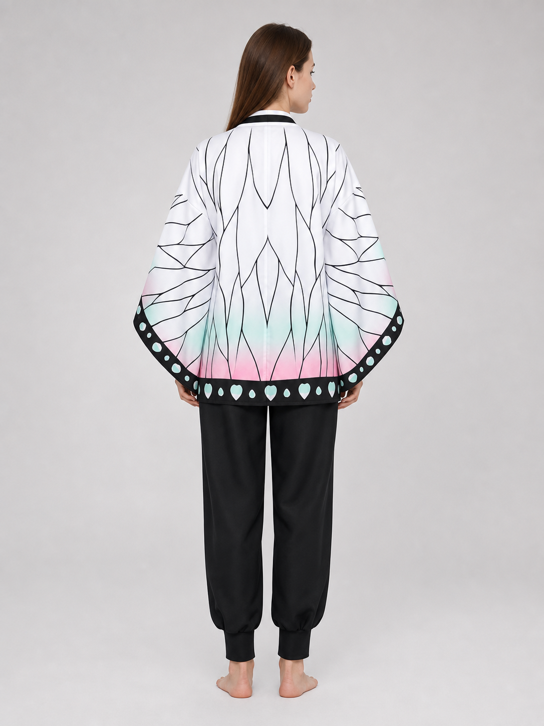 Anime-style cosplay costume with cloak and accessories back view