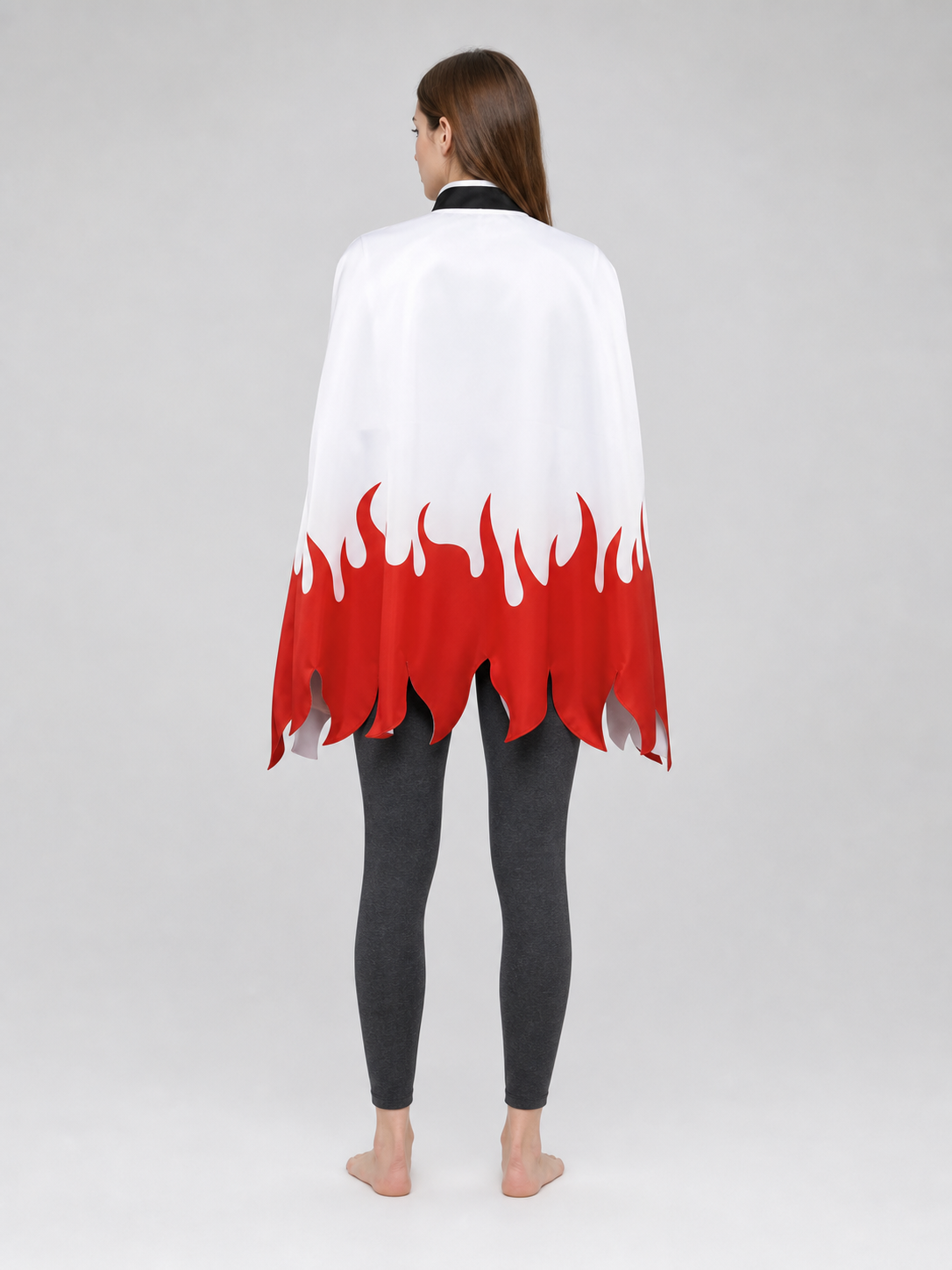 Anime cosplay costume with cape, belt, and leg warmers