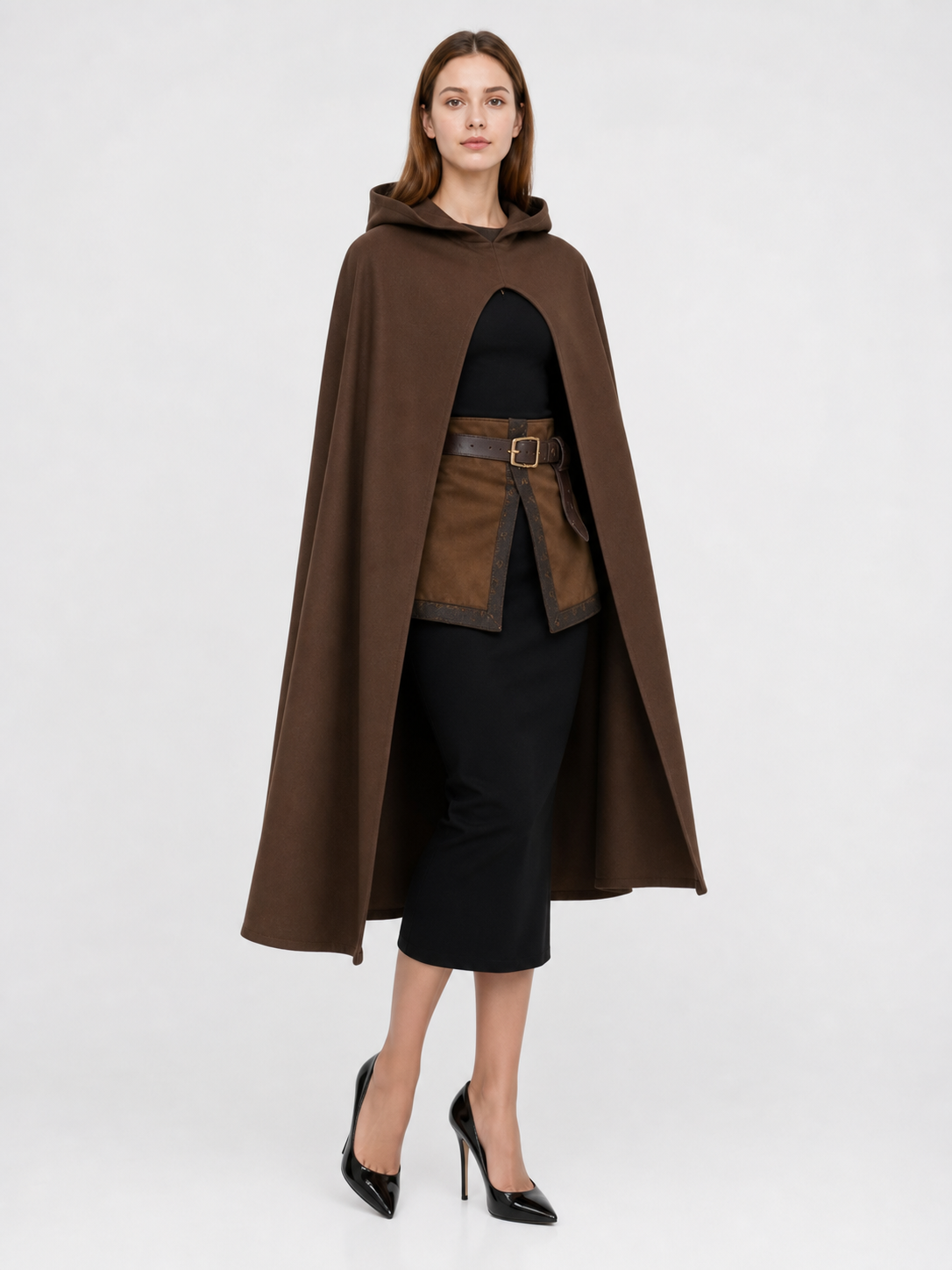 Brown hooded cape shown full-body on a model, worn over a black outfit with a front clasp and open sides
