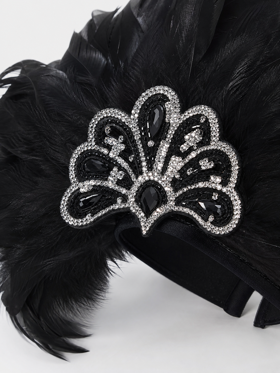 Carnival feather and sequin headpiece