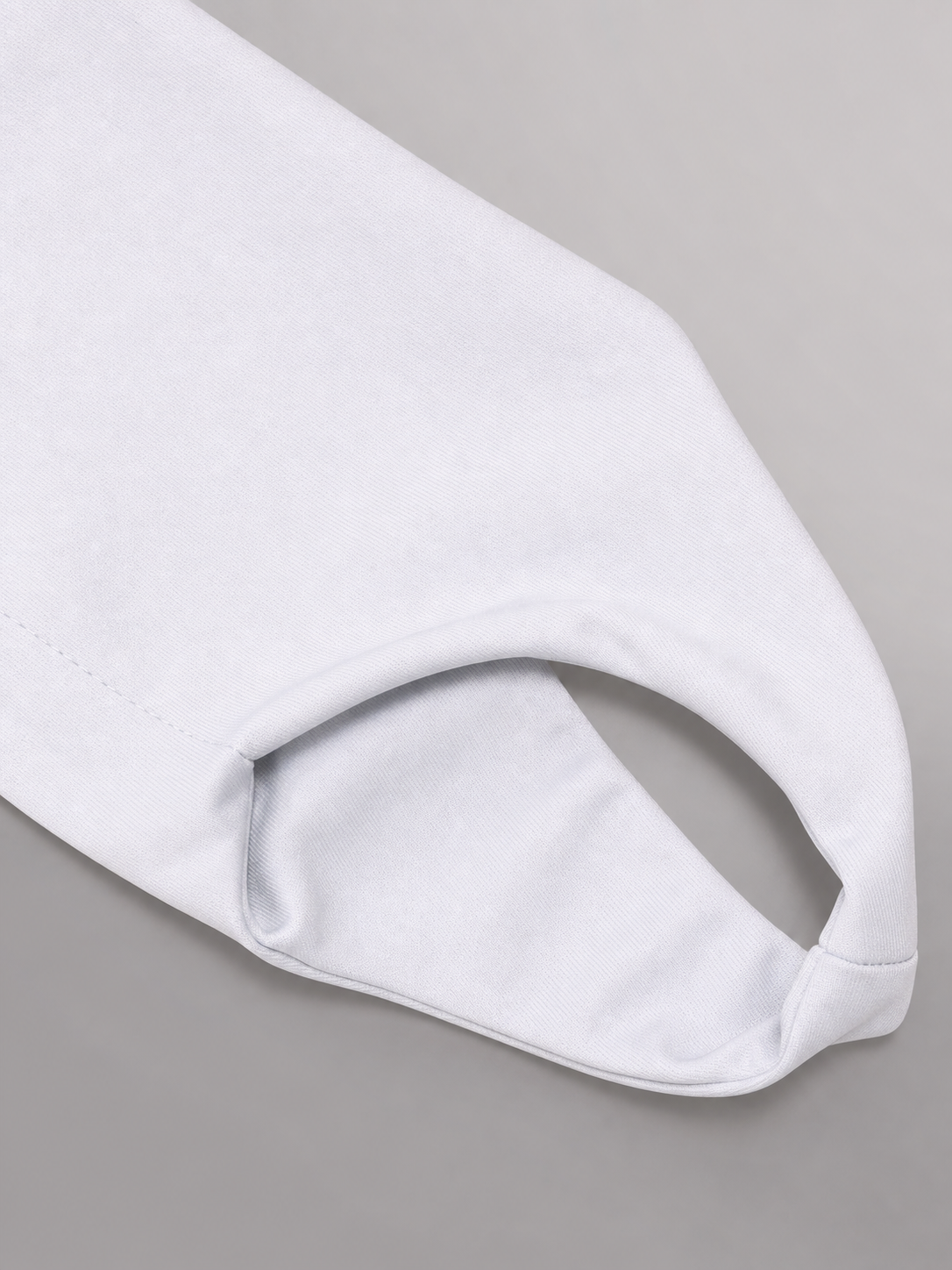 Description: White shoe covers—a pair of accessories for completing a costume and neatly covering shoes. The design consists of two identical overlays with a simple construction: the covers are worn over shoes, have open openings around the