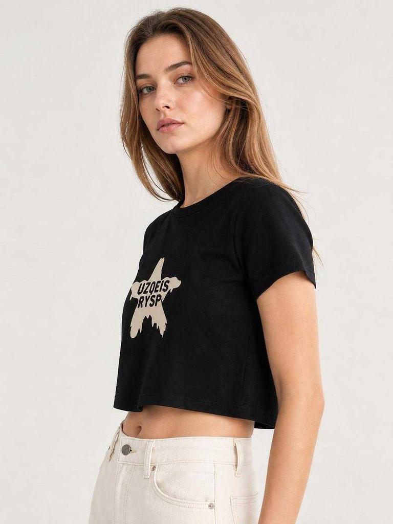 Black T-shirt with star print for an outfit side view
