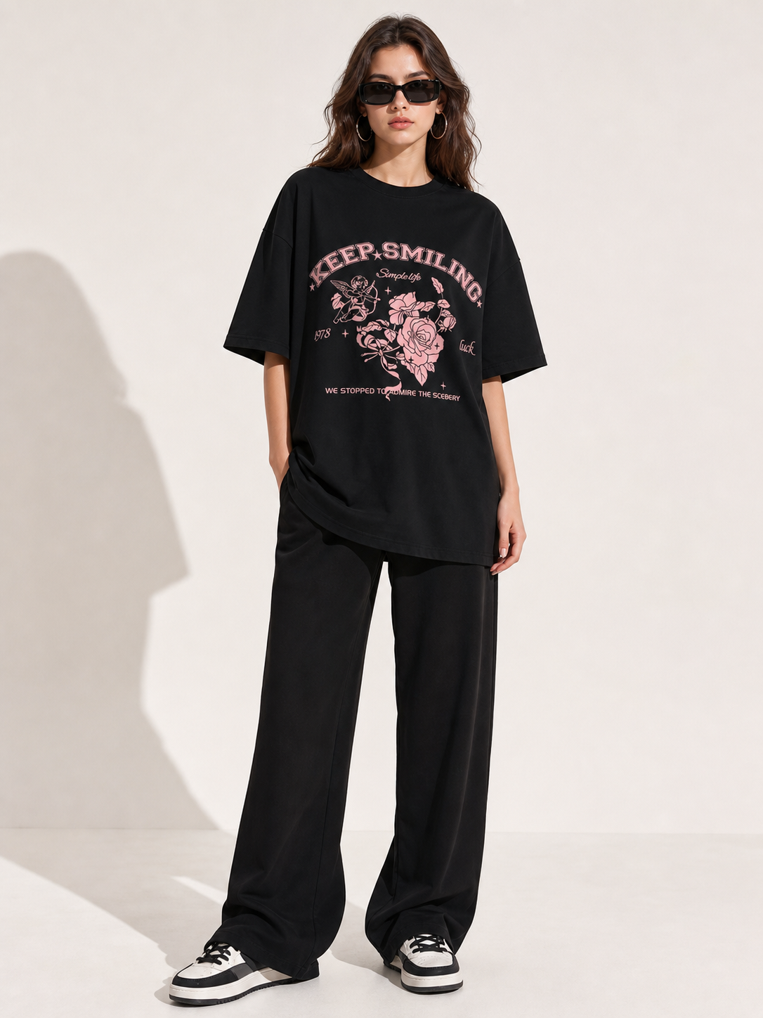 Women's black T-shirt with rose and angel print, loose fit