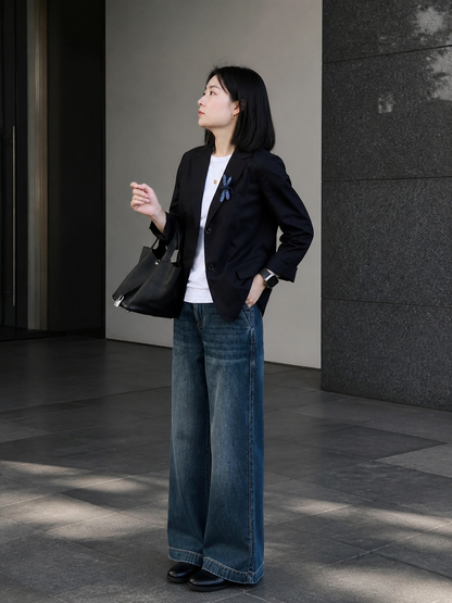 Women's black blazer with lapels and a tailored fit