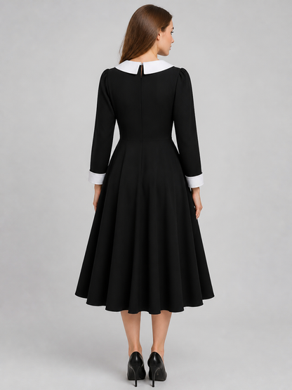Black Wednesday-style dress with a white collar back view 3