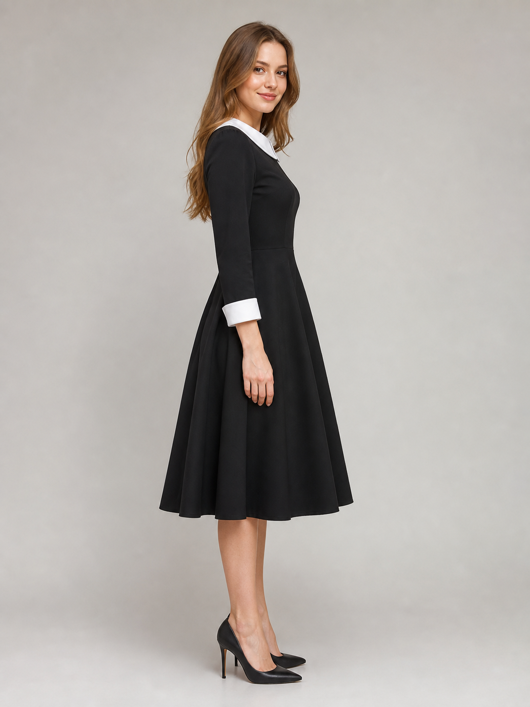 Black Wednesday-style dress with a white collar side view 3