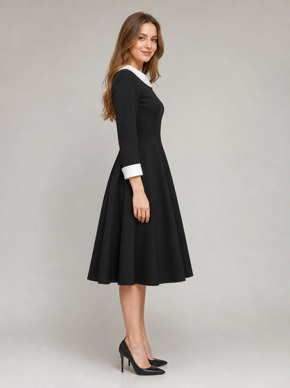 Black Wednesday-style dress with a white collar side view 3