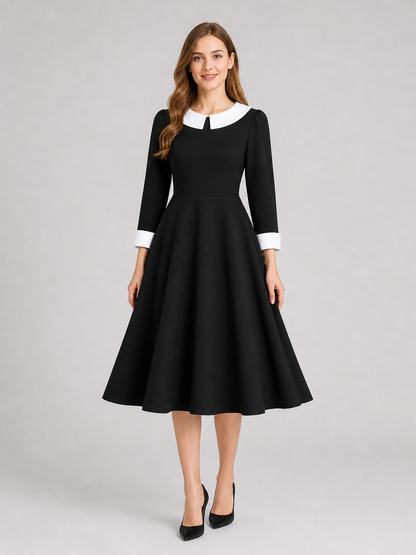Black Wednesday-style dress with a white collar