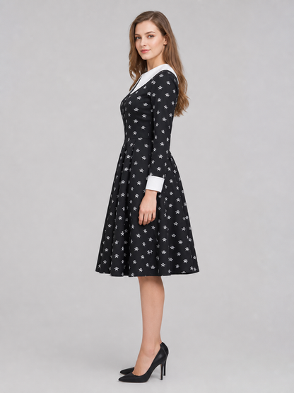 Gothic Dress with Skulls, Collar, and Buttons