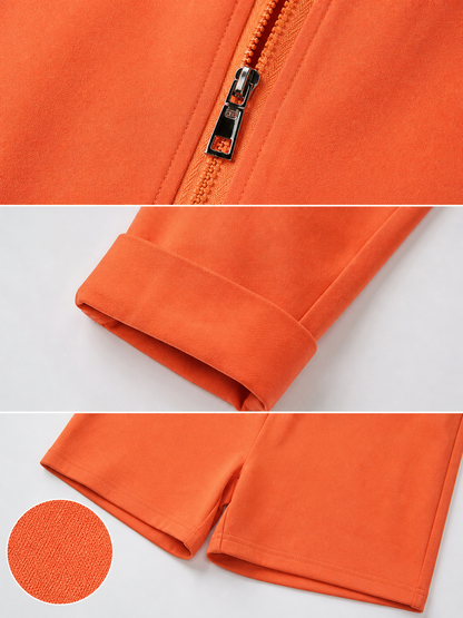 Orange short romper with zipper and belt