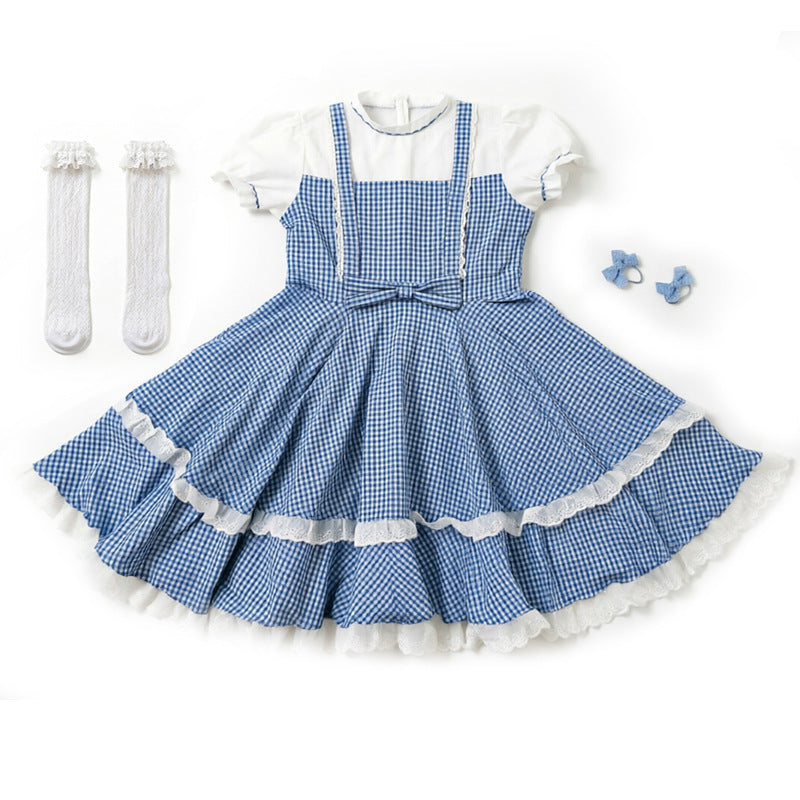 Retro-style plaid dress with socks and bows