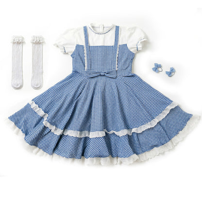 Retro-style plaid dress with socks and bows