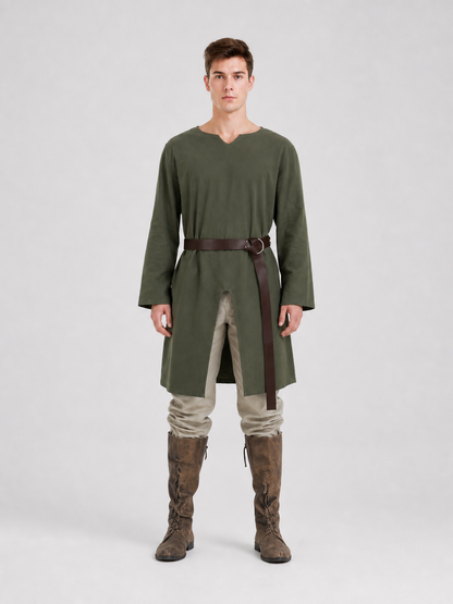 Green long-sleeve tunic shown full-body on a model, with a brown ring belt, hanging strap, cream trousers, and tall brown boots