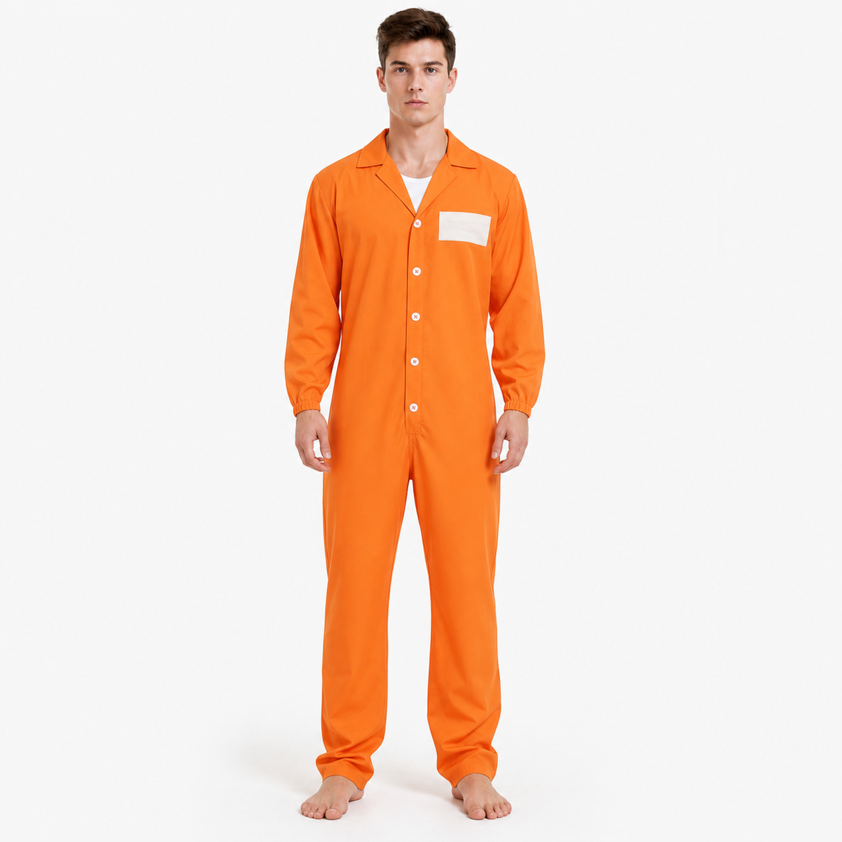 Full-body model in an orange button-front jumpsuit with long sleeves, pointed collar, white chest patch, and bare feet