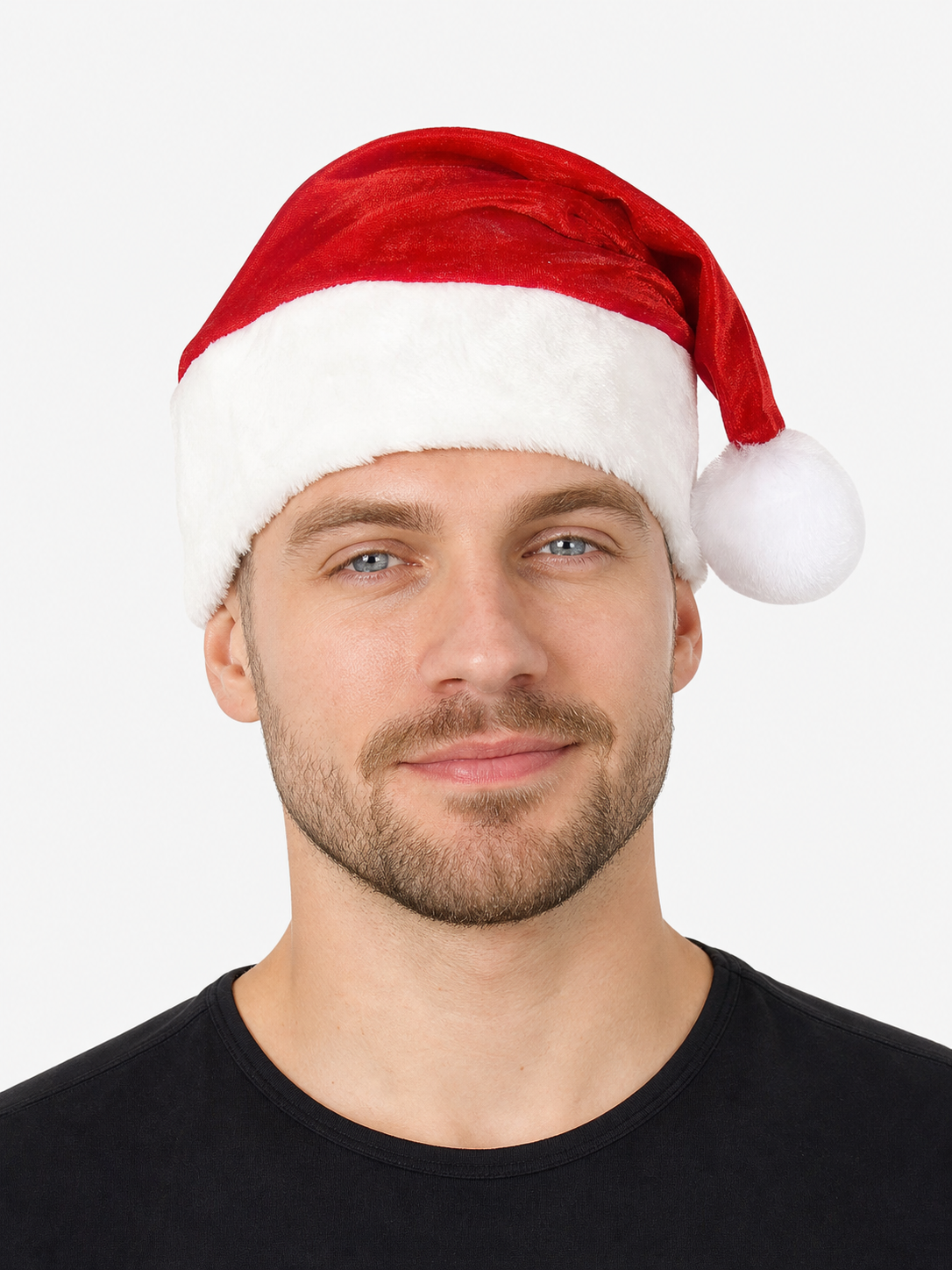 Close-up of a red velvet hat with a wide white plush brim and white pom-pom on a model