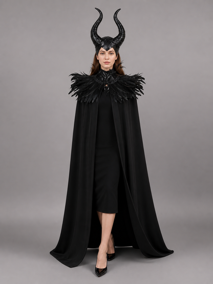 Black costume cape shown full-body on a model, with a long draped silhouette, tall curved horns, and layered black feather trim