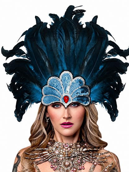 Dark blue feather headpiece with a sequined blue front panel and red teardrop centerpiece, shown in a close frontal portrait