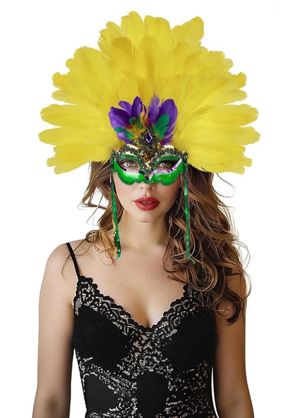 Feather headdress and green eye mask worn by a model, with yellow and purple feathers, jeweled trim, and green hanging cords