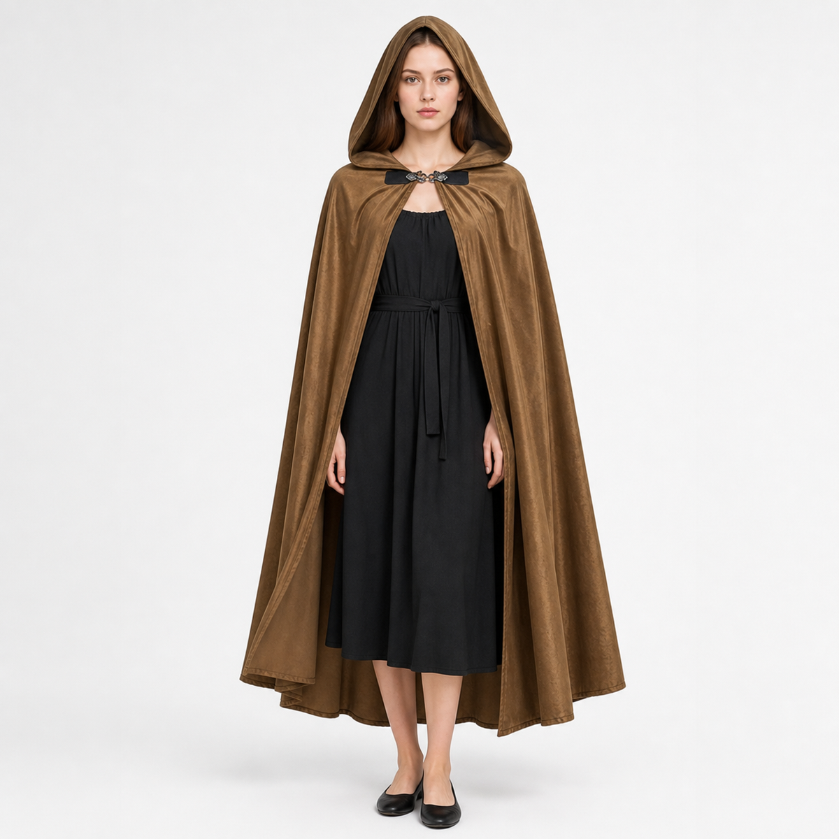 Brown hooded cape on a full-body model over a black dress, with a front clasp and long draped panels