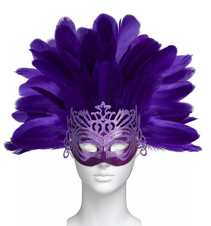 Masquerade mask on a white mannequin with a large fan of purple feathers and a glittered lavender crown design