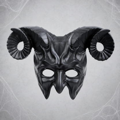 Black full-face demon mask with curled horns shown front-facing against a gray spiderweb background