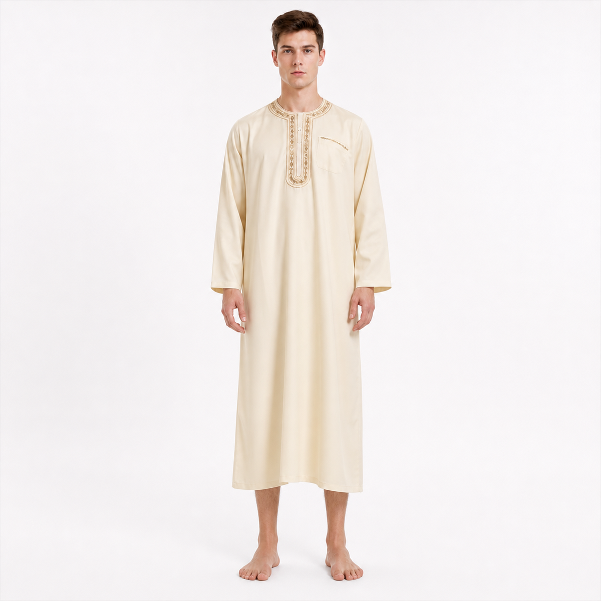 Long cream robe on a male model, shown full-body from the front, with long sleeves, an embroidered chest placket, and bare feet