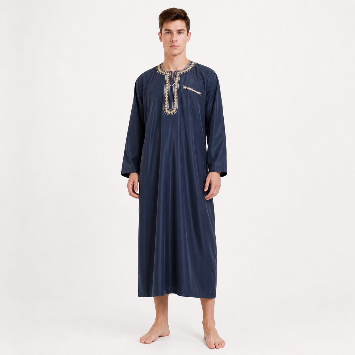 Navy blue full-length robe shown on a barefoot full-body model, featuring long sleeves and embroidered trim around the neckline and chest