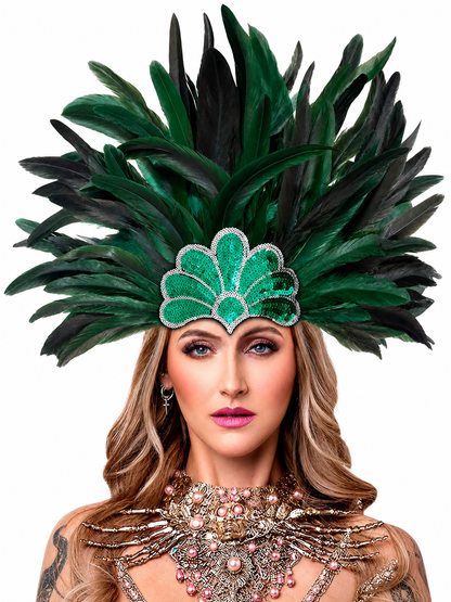 Feather carnival headpiece with green and black plumes and a beaded green centerpiece, shown on a model with jeweled neck adornment