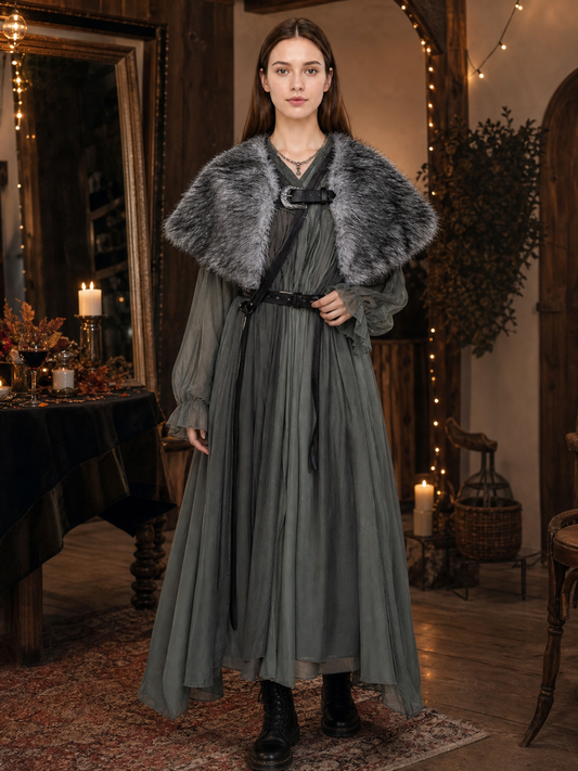 Dark gray plush-textured shoulder shawl with wide coverage and front clasp, shown on a full-body model over a long gray dress