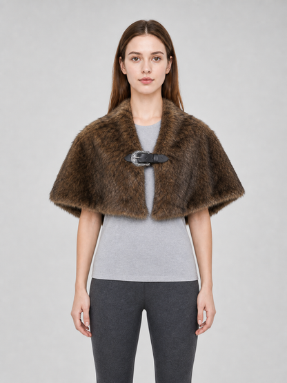 Brown fur-like shoulder cape with a black strap and silver buckle, shown from the front on a model