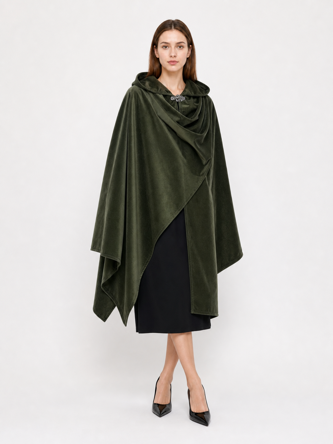 Dark green hooded cloak shown full-body on a model, with a draped cowl front, pointed sides, and a silver clasp