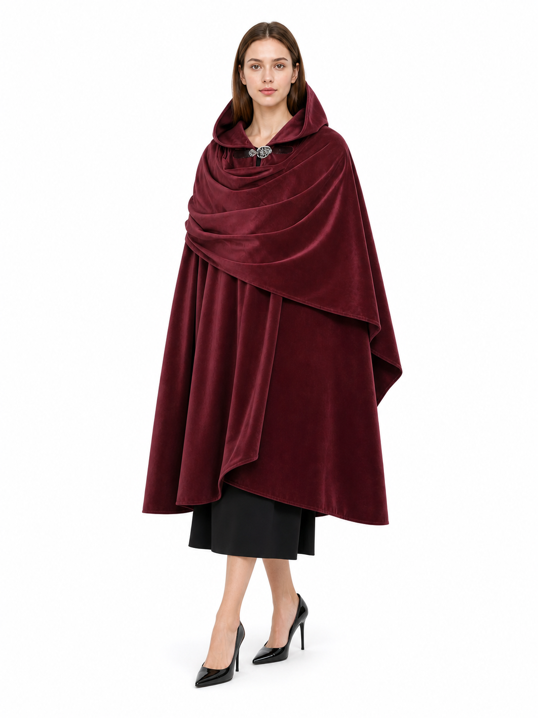 Burgundy velvety hooded cape shown full-body on a model, with layered draping over a black dress