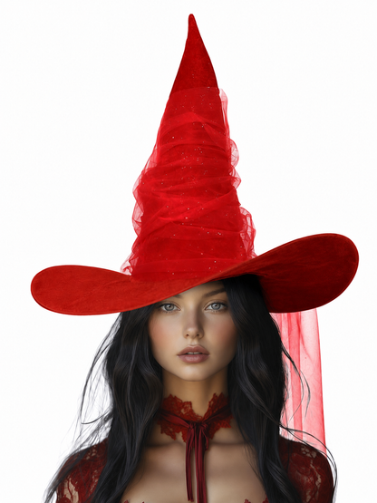 Red pointed witch hat modeled with a wide curved brim, layered sheer cone, glitter specks, and a long veil