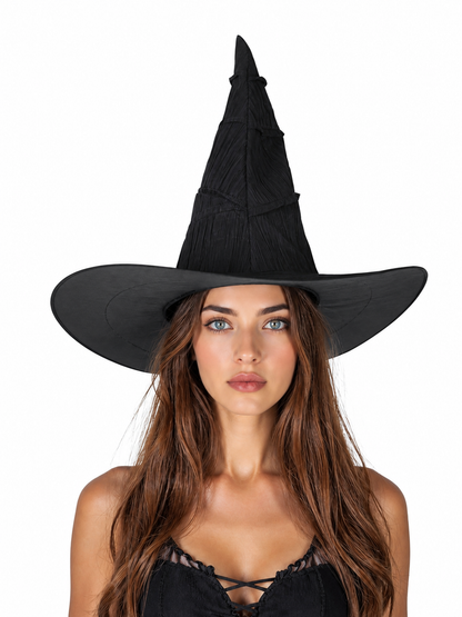 Black pointed witch hat with a wide brim worn by a front-facing model in a black lace-up top
