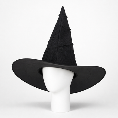 Black pointed witch hat with a wide curved brim displayed on a white mannequin head