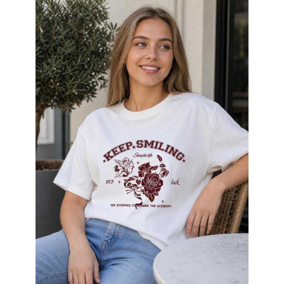 Loose-fit oversized white T-shirt with print lifestyle view