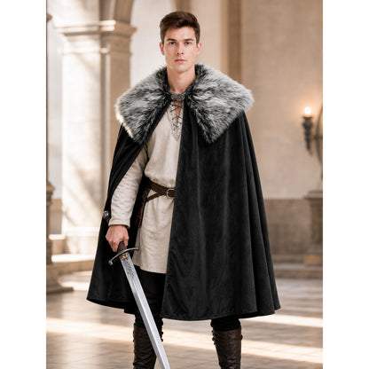 Black cloak with a gray faux fur collar, styled on a model wearing a cream tunic and holding a sword indoors