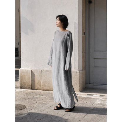 Gray long dress with long sleeves and a slit
