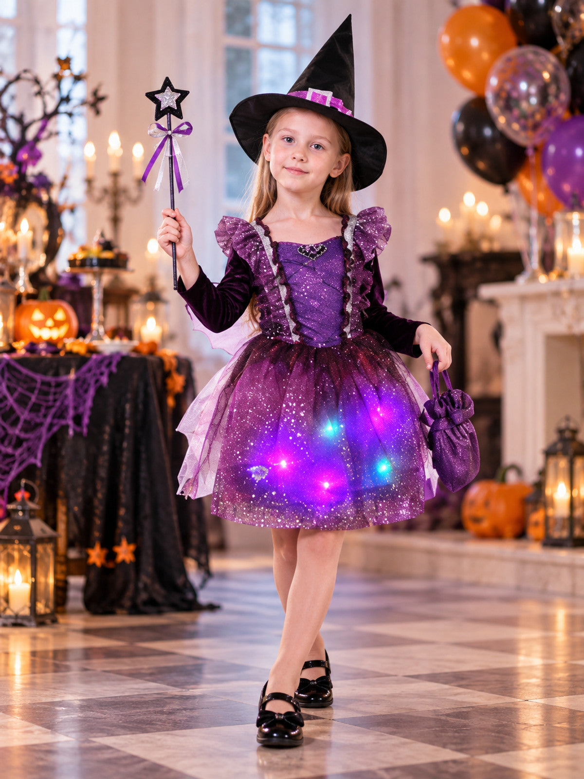 Kids' witch carnival costume with a glowing skirt