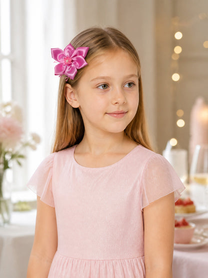 Pink carnival headband with a bow and flower for Halloween lifestyle view
