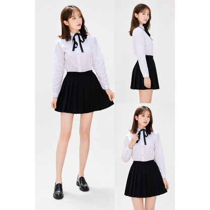 Black pleated mini skirt in a school style lifestyle view