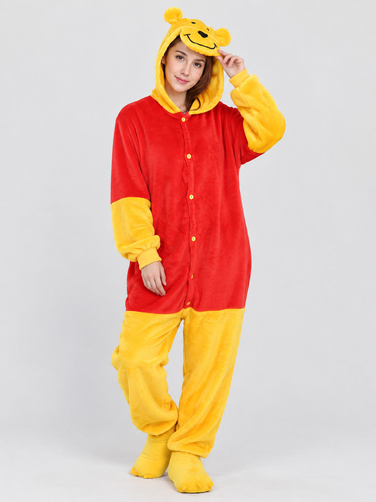 Red and yellow pajama jumpsuit with bear ears