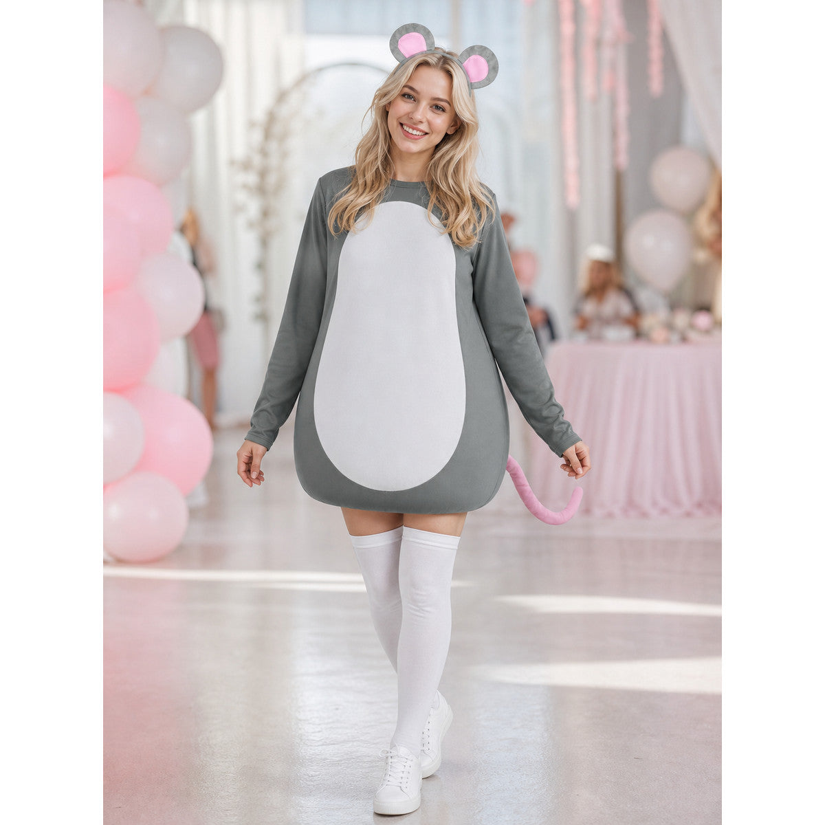 Gray mouse costume dress with white belly and pink tail modeled at a decorated indoor party venue
