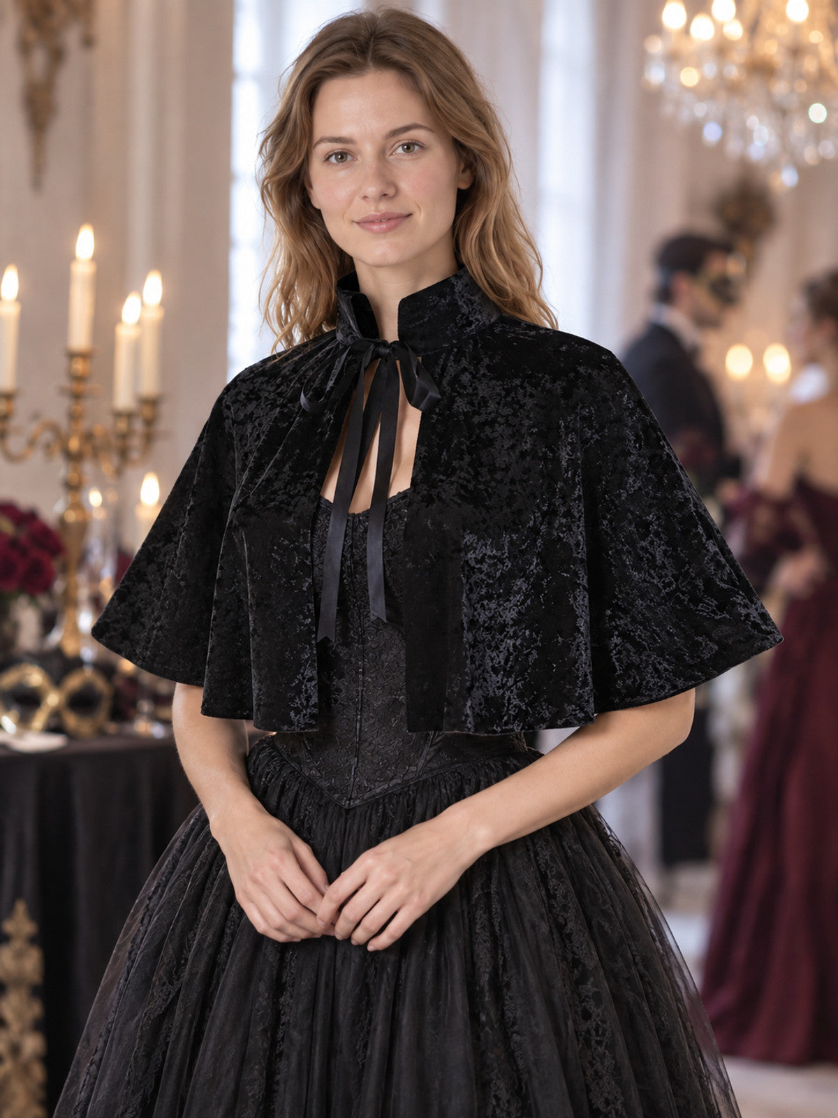 Black velvet cape with high collar and ties