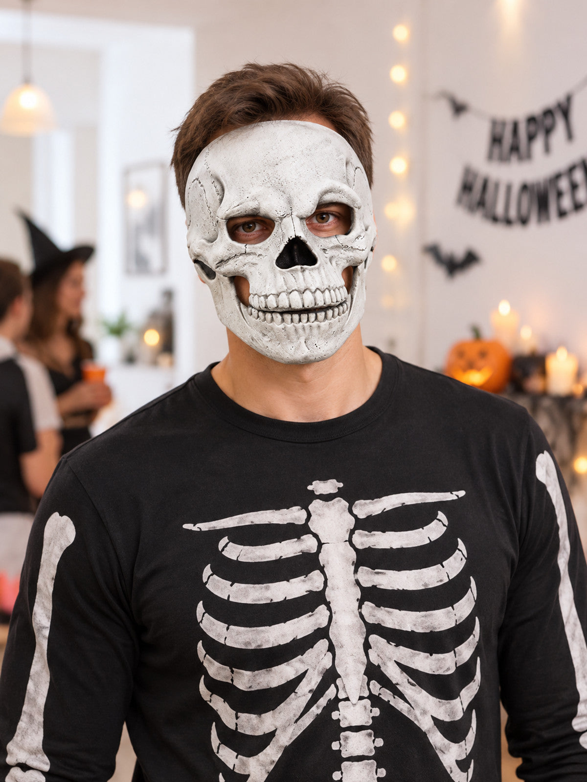 White skull mask with teeth and dark eye sockets