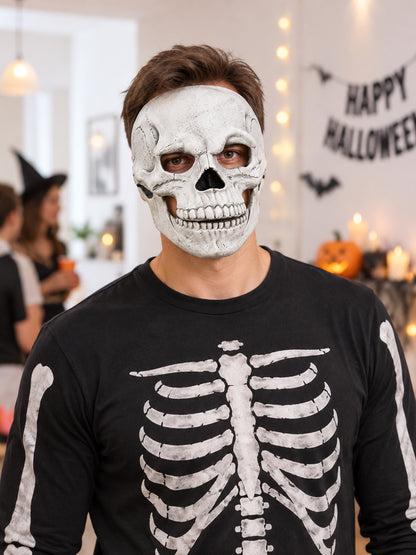 White skull mask with teeth and dark eye sockets