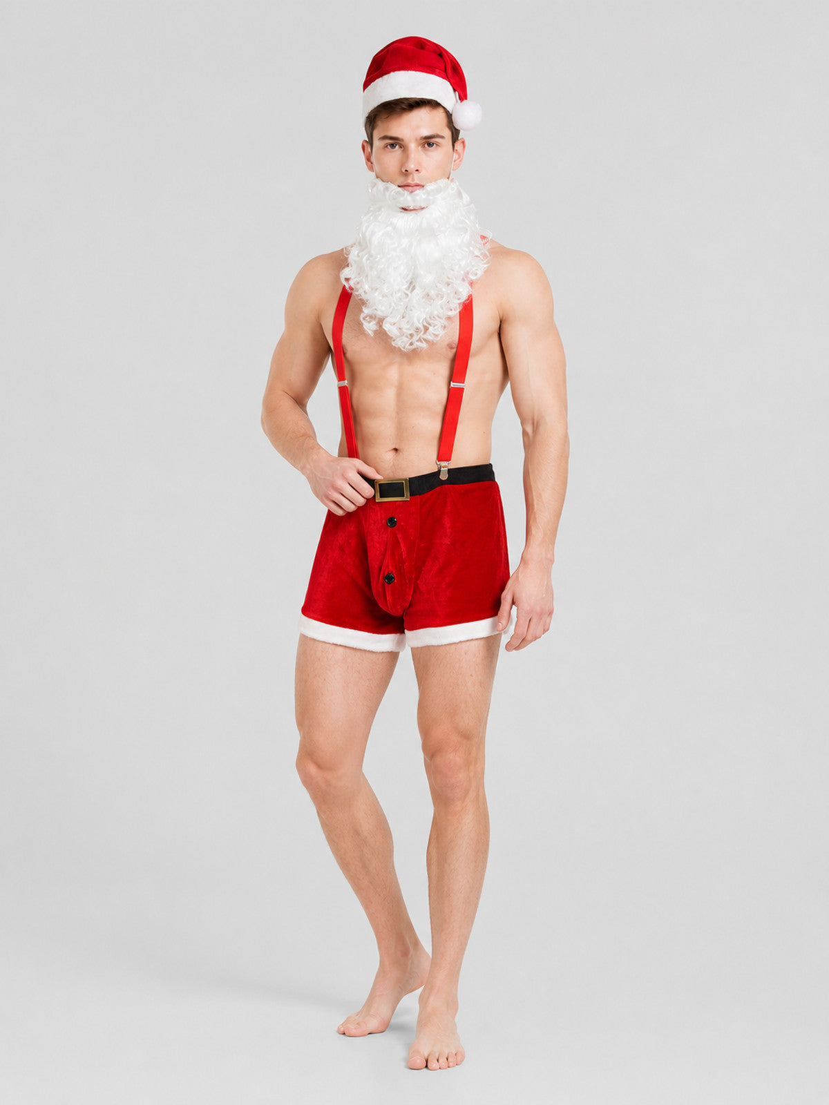 Full-body model wearing a red velvet hat with white trim and beard, red shorts, black belt, and suspenders